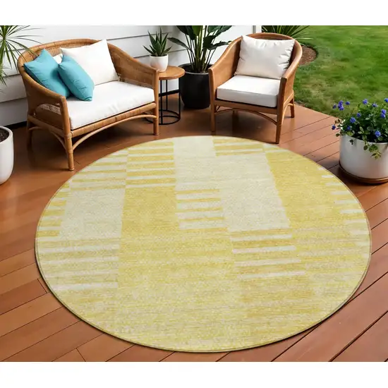 8' Gold Wheat And Ivory Round Striped Washable Indoor Outdoor Area Rug Photo 1