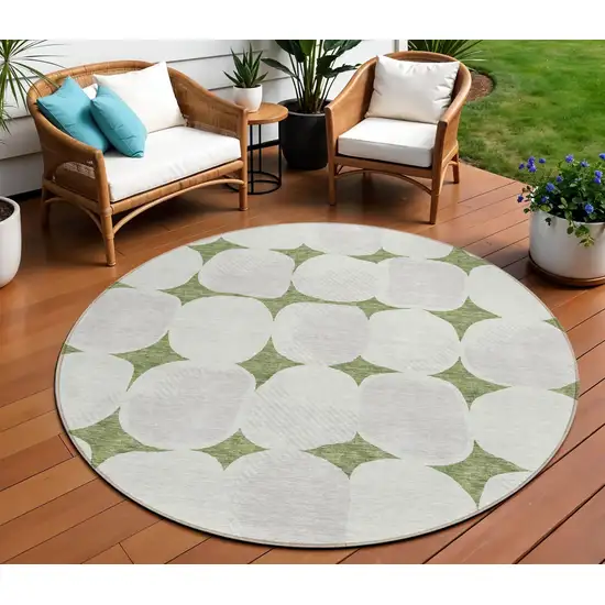 8' Green And Beige Round Abstract Washable Indoor Outdoor Area Rug Photo 1