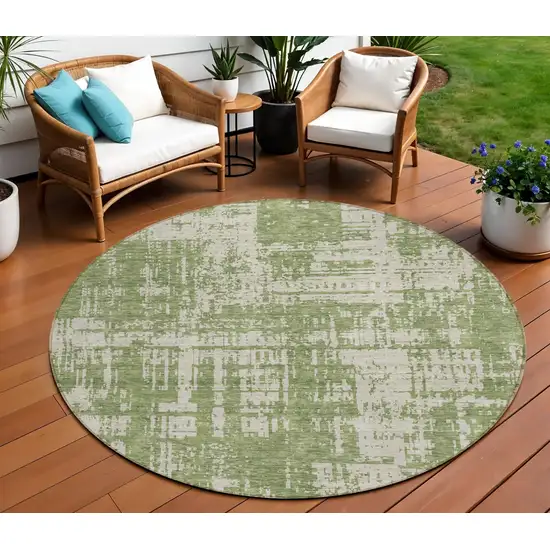 8' Green And Beige Round Abstract Washable Indoor Outdoor Area Rug Photo 1