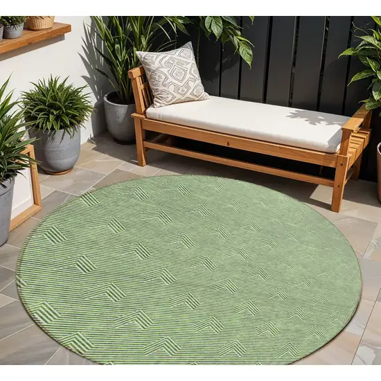 8' Green And Beige Round Geometric Washable Indoor Outdoor Area Rug Photo 1