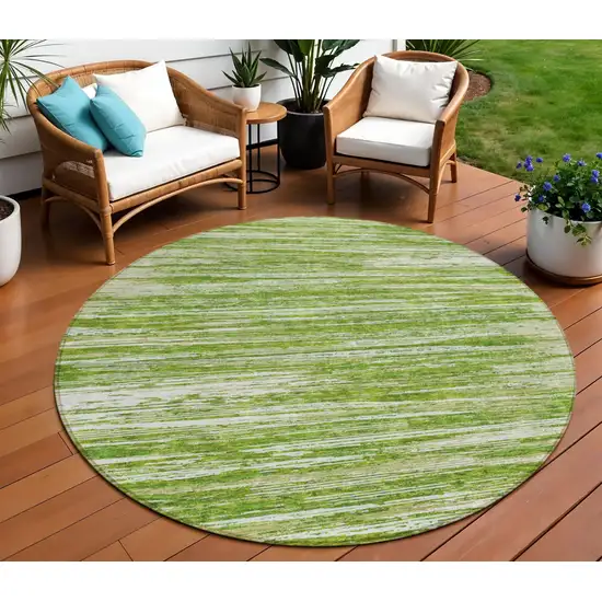 8' Green And Ivory Round Striped Washable Indoor Outdoor Area Rug Photo 1