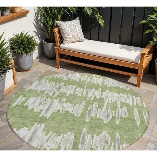 8' Green Gray And Ivory Round Striped Washable Indoor Outdoor Area Rug Photo 1