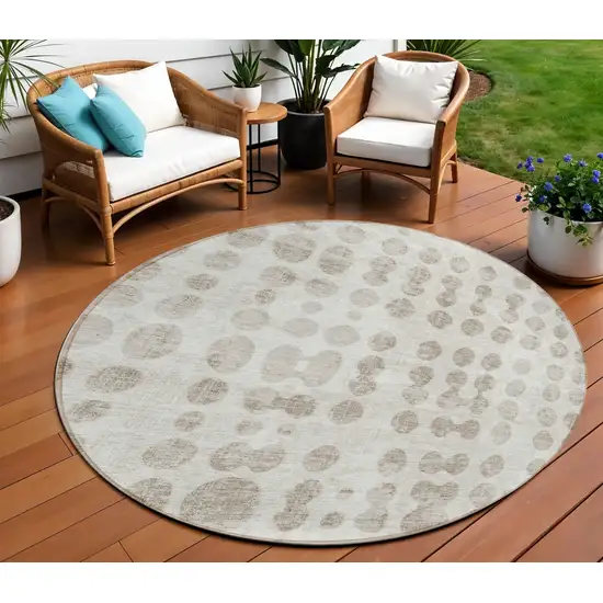 8' Ivory And Beige Round Abstract Washable Indoor Outdoor Area Rug Photo 1