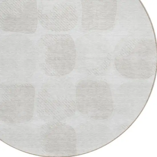 8' Ivory And Beige Round Abstract Washable Indoor Outdoor Area Rug Photo 4