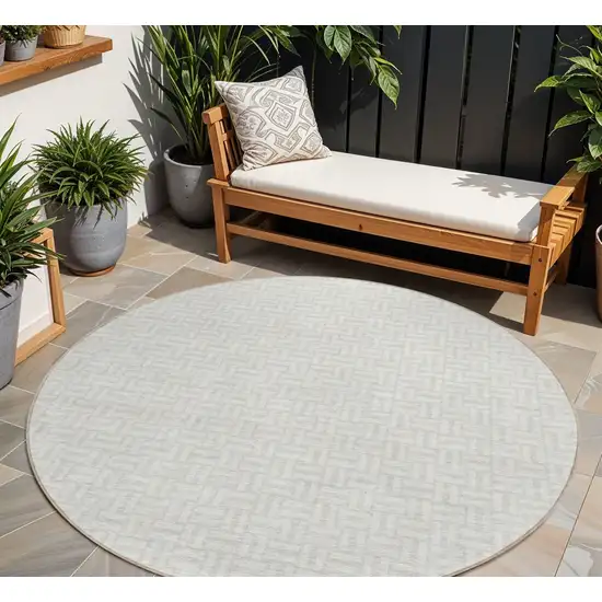 8' Ivory And Silver Round Geometric Washable Indoor Outdoor Area Rug Photo 1