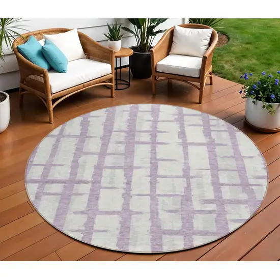8' Lavender And Ivory Round Striped Washable Indoor Outdoor Area Rug Photo 1