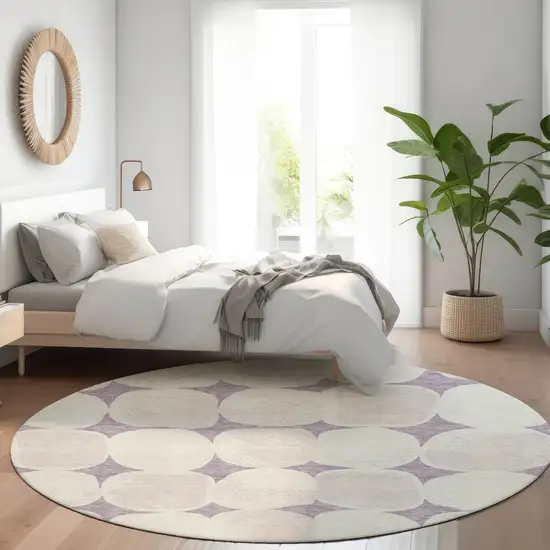 8' Lavender Beige And Ivory Round Abstract Washable Indoor Outdoor Area Rug Photo 7