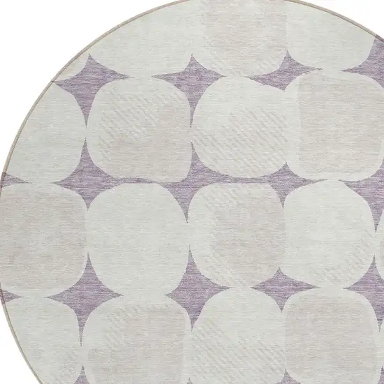 8' Lavender Beige And Ivory Round Abstract Washable Indoor Outdoor Area Rug Photo 4