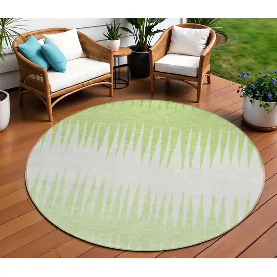 8' Lime Green And Ivory Round Striped Washable Indoor Outdoor Area Rug Photo 1