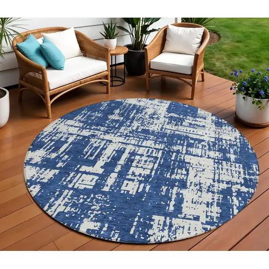 8' Navy Blue And Ivory Round Abstract Washable Indoor Outdoor Area Rug Photo 1