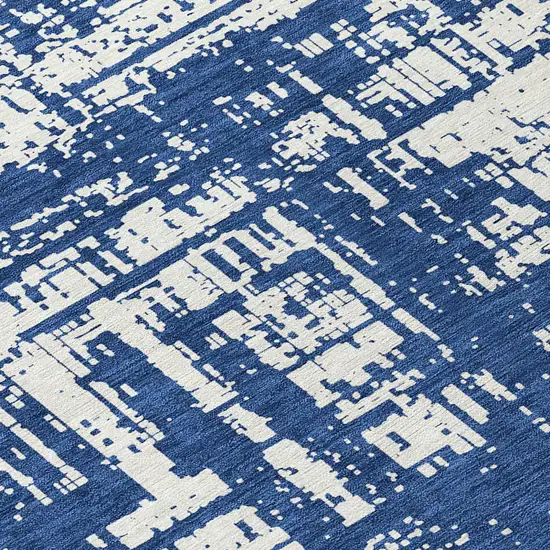 8' Navy Blue And Ivory Round Abstract Washable Indoor Outdoor Area Rug Photo 8
