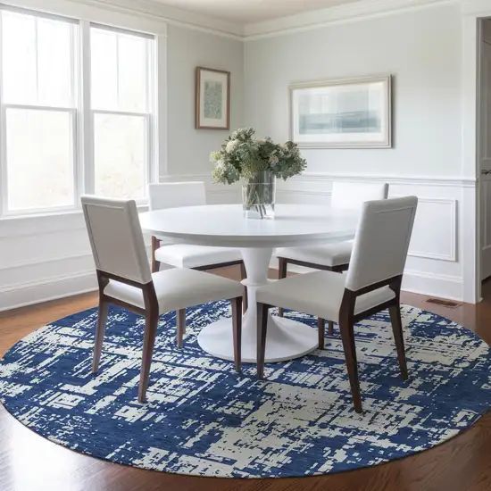 8' Navy Blue And Ivory Round Abstract Washable Indoor Outdoor Area Rug Photo 7