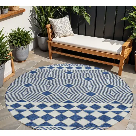 8' Navy Blue And Ivory Round Geometric Washable Indoor Outdoor Area Rug Photo 1