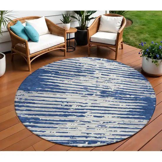 8' Navy Blue And Ivory Round Striped Washable Indoor Outdoor Area Rug Photo 1