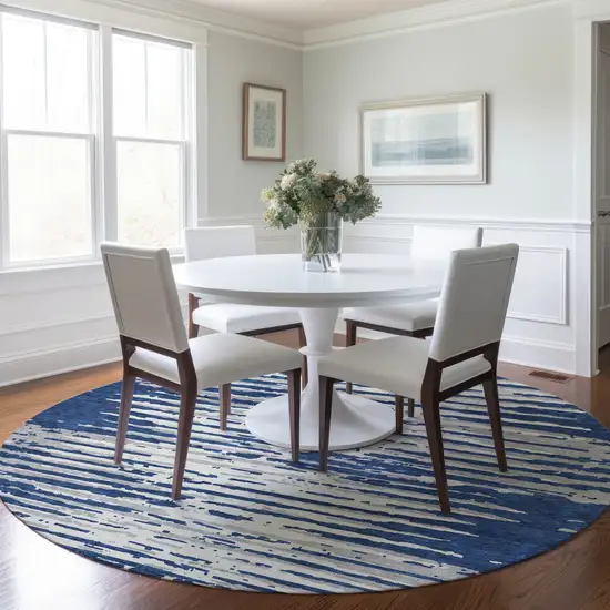 8' Navy Blue And Ivory Round Striped Washable Indoor Outdoor Area Rug Photo 7