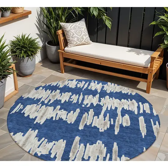 8' Navy Blue Gray And Ivory Round Striped Washable Indoor Outdoor Area Rug Photo 1