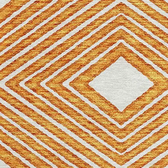 8' Orange And Ivory Round Geometric Washable Indoor Outdoor Area Rug Photo 5