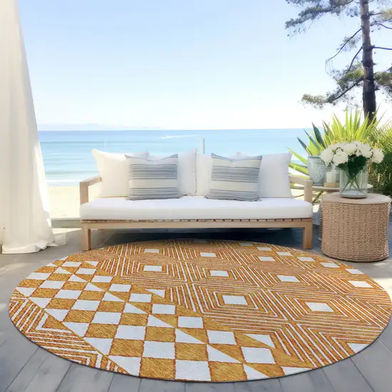 8' Orange And Ivory Round Geometric Washable Indoor Outdoor Area Rug Photo 7