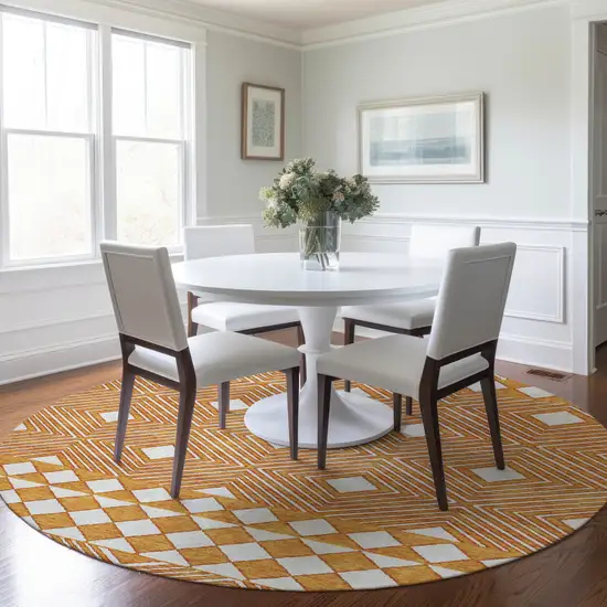 8' Orange And Ivory Round Geometric Washable Indoor Outdoor Area Rug Photo 8