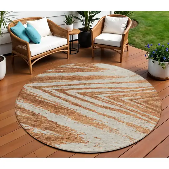 8' Orange Brown And Beige Round Abstract Washable Indoor Outdoor Area Rug Photo 1
