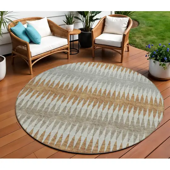 8' Orange Gray And Beige Round Striped Washable Indoor Outdoor Area Rug Photo 1