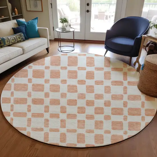 8' Peach And Beige Round Geometric Washable Indoor Outdoor Area Rug Photo 8