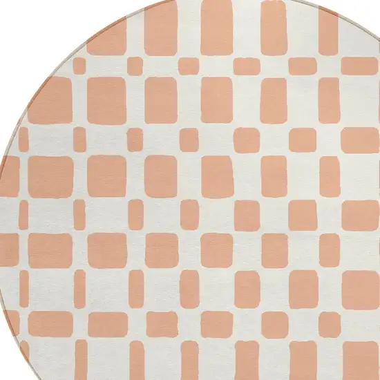 8' Peach And Beige Round Geometric Washable Indoor Outdoor Area Rug Photo 5