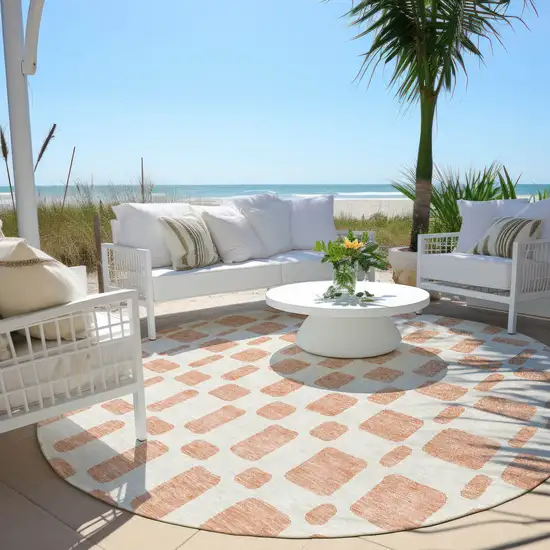 8' Peach And Beige Round Geometric Washable Indoor Outdoor Area Rug Photo 7
