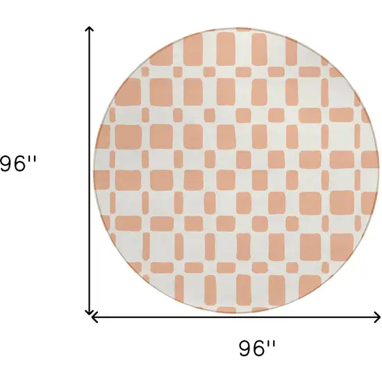 8' Peach And Beige Round Geometric Washable Indoor Outdoor Area Rug Photo 3
