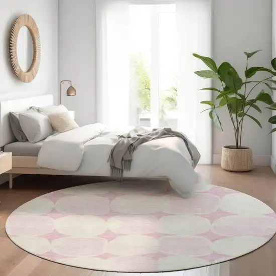 8' Pink And Ivory Round Abstract Washable Indoor Outdoor Area Rug Photo 7