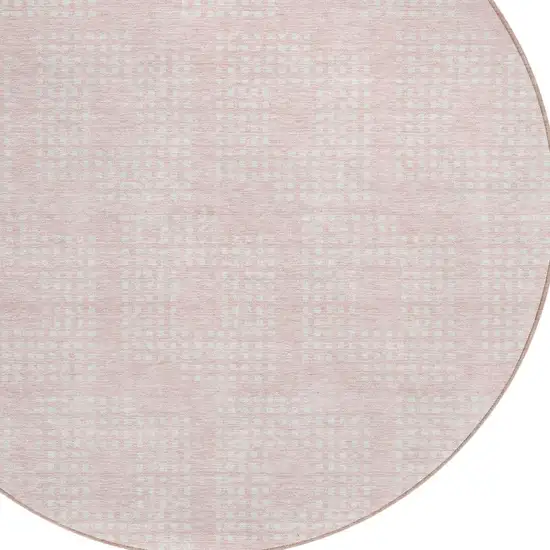 8' Pink And Ivory Round Geometric Washable Indoor Outdoor Area Rug Photo 4