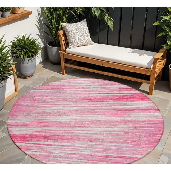 8' Pink And Ivory Round Striped Washable Indoor Outdoor Area Rug Photo 1