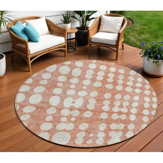 8' Salmon And Ivory Round Abstract Washable Indoor Outdoor Area Rug Photo 1