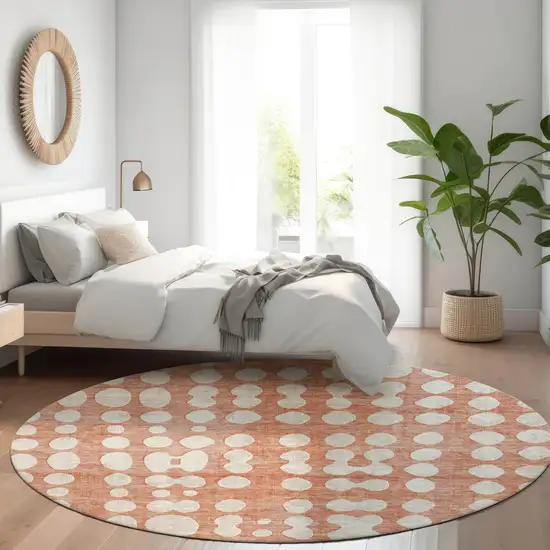 8' Salmon And Ivory Round Abstract Washable Indoor Outdoor Area Rug Photo 8