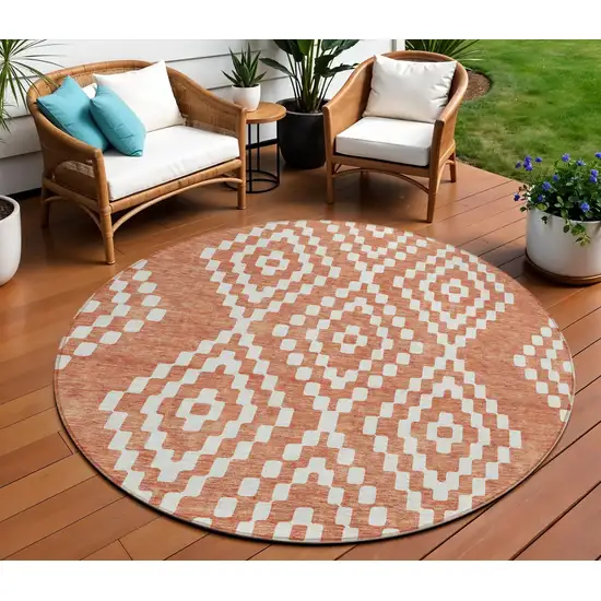 8' Salmon And Ivory Round Geometric Washable Indoor Outdoor Area Rug Photo 1