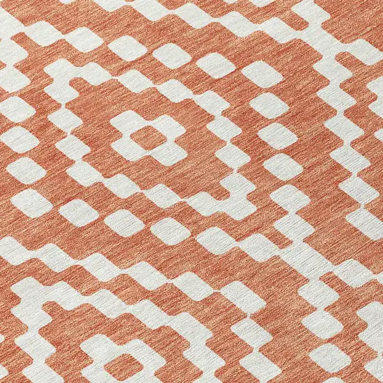 8' Salmon And Ivory Round Geometric Washable Indoor Outdoor Area Rug Photo 4