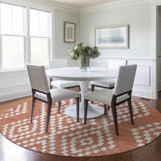 8' Salmon And Ivory Round Geometric Washable Indoor Outdoor Area Rug Photo 8