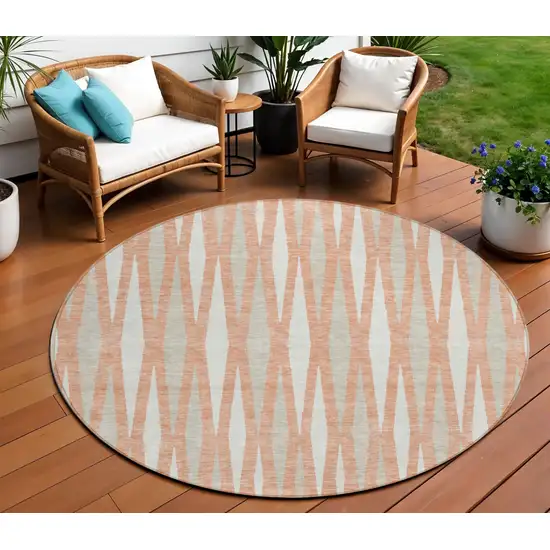 8' Salmon Gray And Ivory Round Geometric Washable Indoor Outdoor Area Rug Photo 1