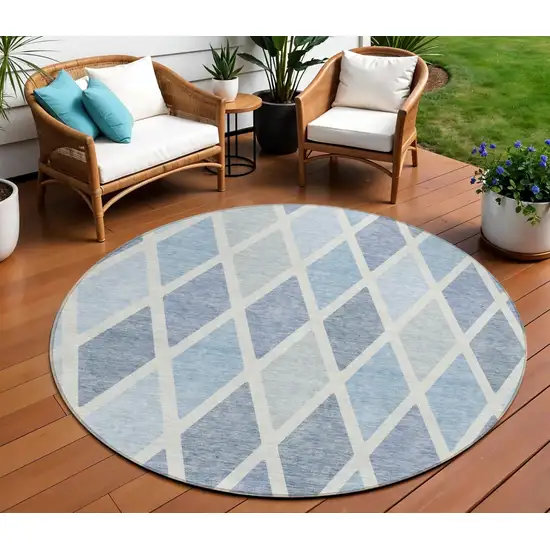 8' Sky Blue And Ivory Round Geometric Washable Indoor Outdoor Area Rug Photo 1