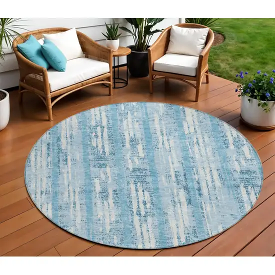 8' Sky Blue And Ivory Round Striped Washable Indoor Outdoor Area Rug Photo 1