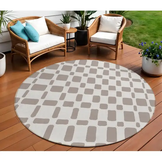 8' Taupe And Beige Round Geometric Washable Indoor Outdoor Area Rug Photo 1