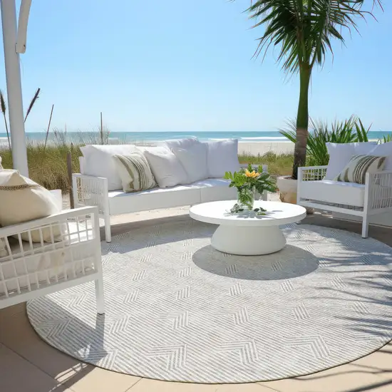 8' Taupe And Ivory Round Geometric Washable Indoor Outdoor Area Rug Photo 5