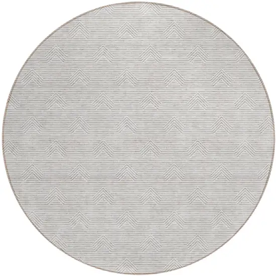 8' Taupe And Ivory Round Geometric Washable Indoor Outdoor Area Rug Photo 2