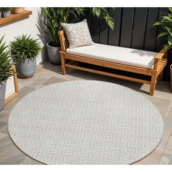 8' Taupe And Silver Round Geometric Washable Indoor Outdoor Area Rug Photo 1