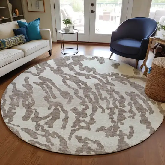 8' Taupe Brown And Ivory Round Animal Print Washable Indoor Outdoor Area Rug Photo 5