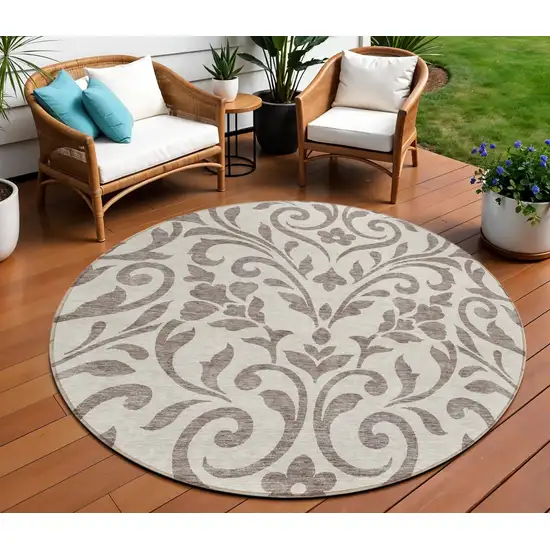 8' Taupe Round Floral Washable Indoor Outdoor Area Rug Photo 1