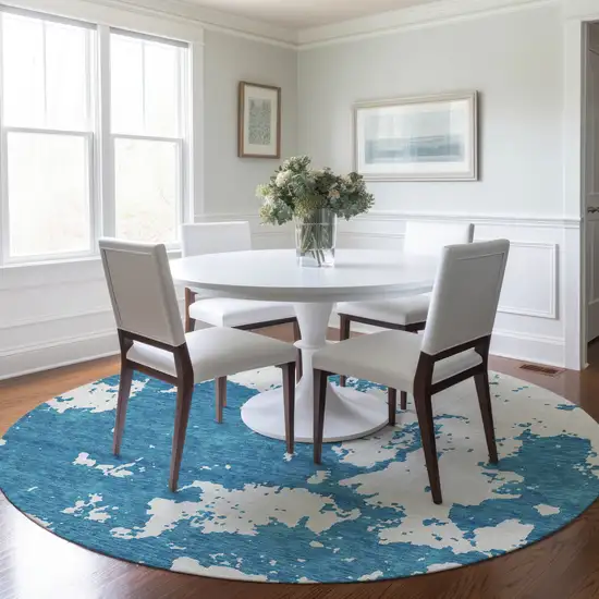 8' Teal Blue And Ivory Round Abstract Washable Indoor Outdoor Area Rug Photo 7