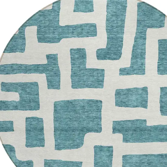 8' Teal Blue And Ivory Round Abstract Washable Indoor Outdoor Area Rug Photo 4