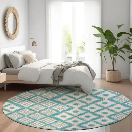 8' Teal Blue And Ivory Round Geometric Washable Indoor Outdoor Area Rug Photo 8