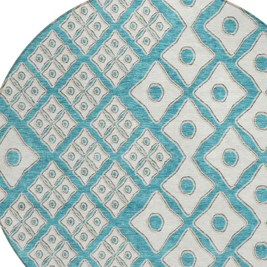 8' Teal Blue And Ivory Round Geometric Washable Indoor Outdoor Area Rug Photo 4
